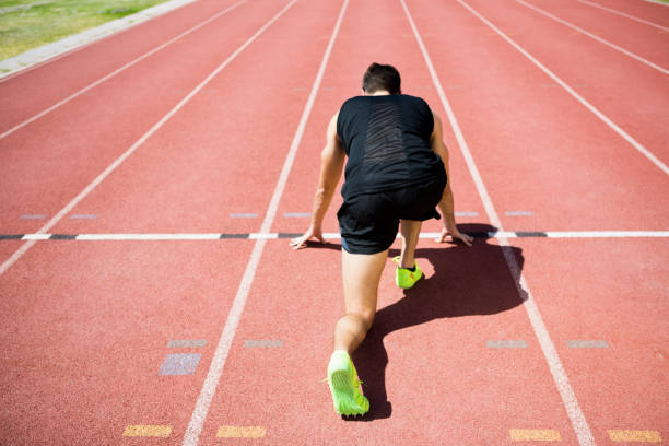 istock Rear view of an athlete ready to run 662468890