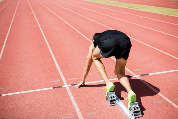 istock Rear view of an athlete ready to run 662475836