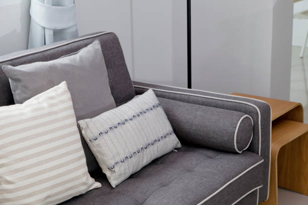 istock cushion on grey sofa at home 662584260