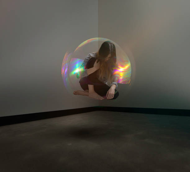 istock Woman floating in bubble with trouble 662607496