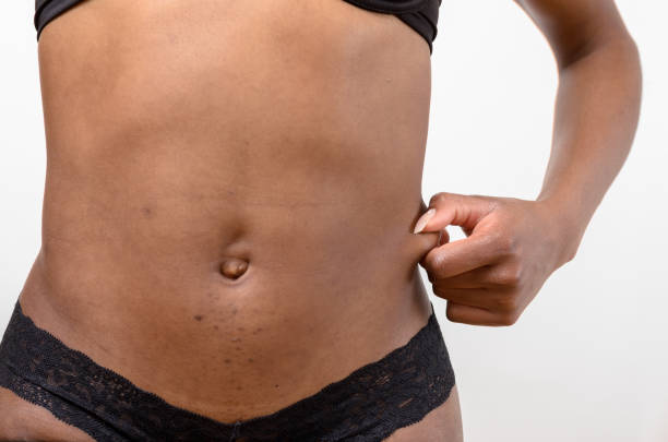 istock Fit toned young woman showing she has no fat 662616258