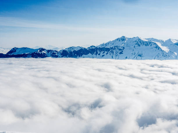 A sea of clouds on the Swiss Alps - 2 A sea of clouds on the Swiss Alps - 2 arosa stock pictures, royalty-free photos & images
