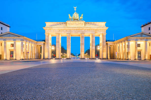 istock The Brandenburg Gate in Berlin at night, Germany 662706584