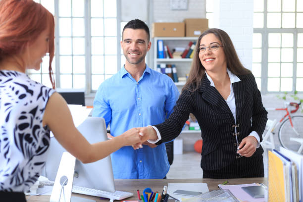 istock Couple making agreement in office 662743804