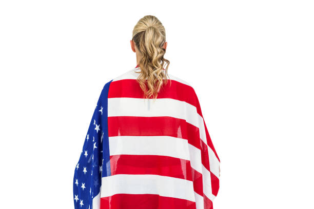 Athlete with american flag wrapped around his body