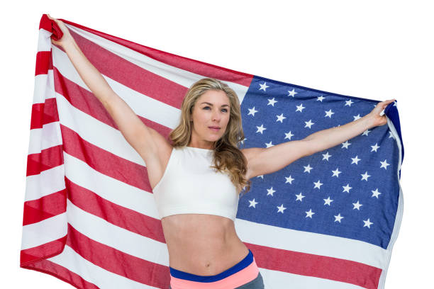 istock Athlete posing with american flag after victory 662801252