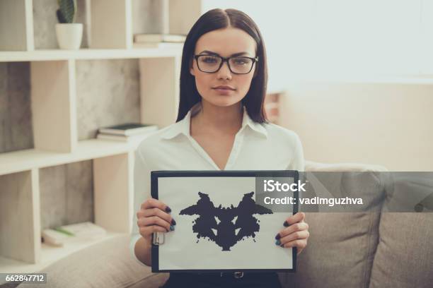 Beautiful Young Psychologist Stock Photo - Download Image Now - Mental Health Professional, Contemplation, Suit