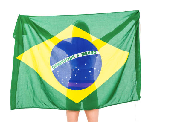 istock Athlete posing with brazilian flag after victory 662861816
