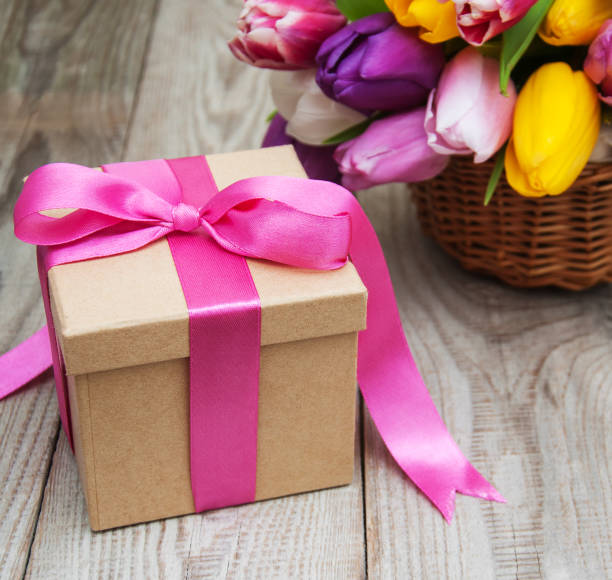 istock Spring tulips flowers and gift box 662879658