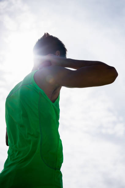 istock Male athlete preparing to throw shot put ball 662883348