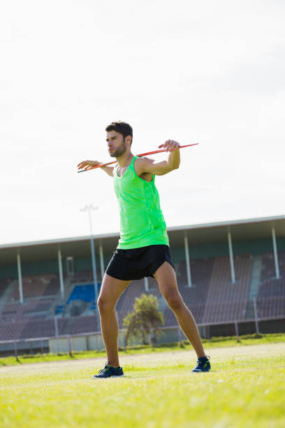 istock Athlete standing with javelin 662884088