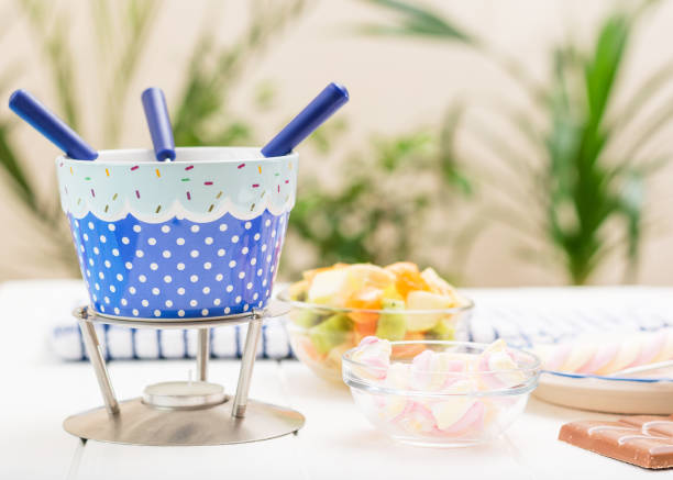 istock White with blue kit for making chocolate fondue. 662922752