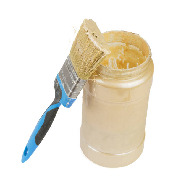 istock Open a paint can and brush isolated on white background. 662922756