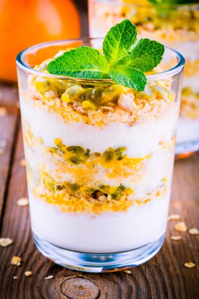 istock Yoghurt granola parfait with passion fruit sauce and mint 662926078