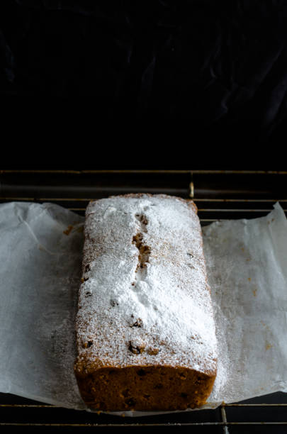 istock Freshly baked cake sprinkled with powdered sugar 662927142