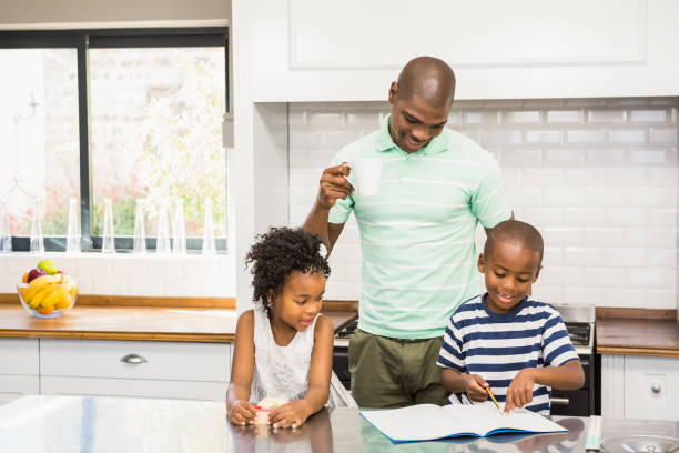 istock Father and children in the kitchen 662935836