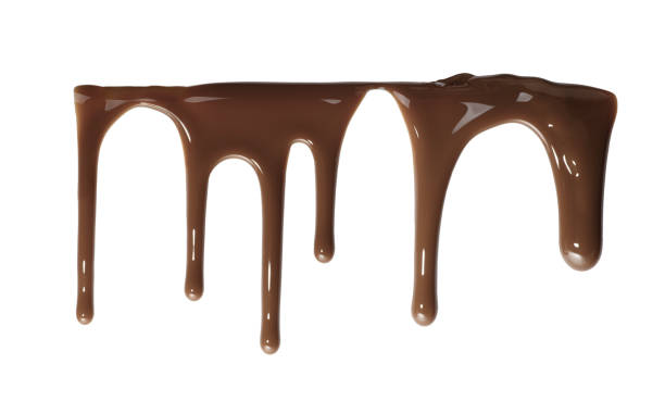 Flowing down liquid chocolate Flowing down liquid chocolate isolated on white background dessert topping photos stock pictures, royalty-free photos & images
