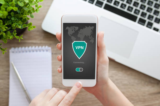 istock woman holding phone app vpn creation Internet protocols protection network 662946622
