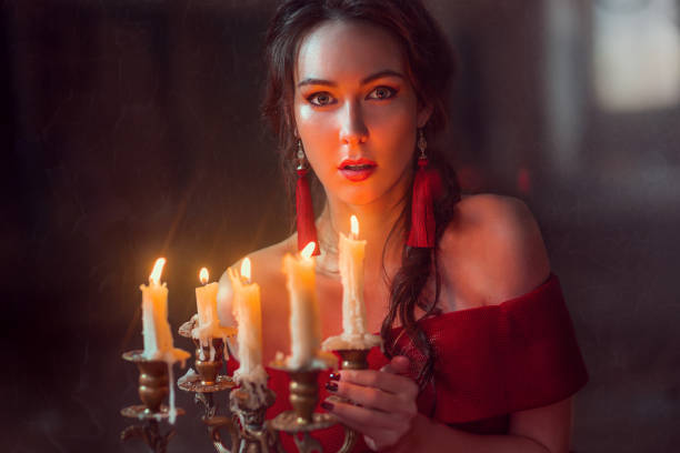 istock Beautiful lady with candles 662948210