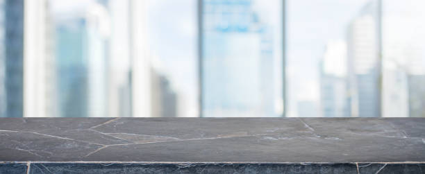 Black Stone table top and blur glass window wall building banner background
