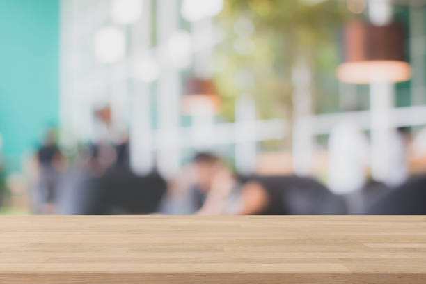 istock Wood table top and blurred restaurant interior background 662985246