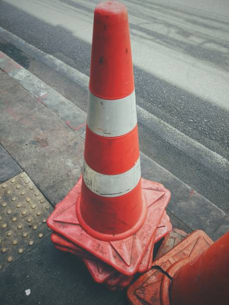 istock Old traffic cones on the street 663013566