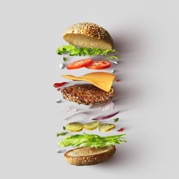 Burger ingredients against white background
