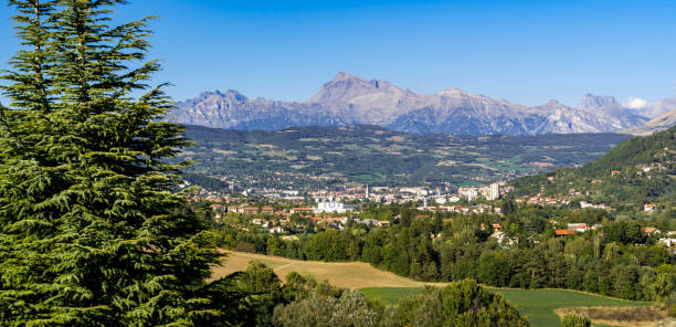 Panoramic of Gap, Hautes Alpes in Summer. French Alps, France The Hautes Alpes city of Gap in Summer. Panoramic. Southern French Alps, France hautes alpes photos stock pictures, royalty-free photos & images