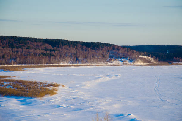 istock Hills in the spring trees snow sunset landscape 663096868