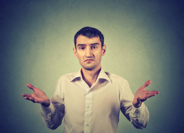 istock Ignorance and arrogance. Young man shrugging shoulders so what I don't know gesture 663127438