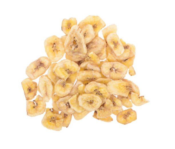 istock Dried banana slices isolated on white background. Top view. 663127864