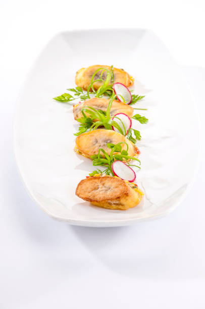istock Banana canapes with spicy cornmeal 663137296