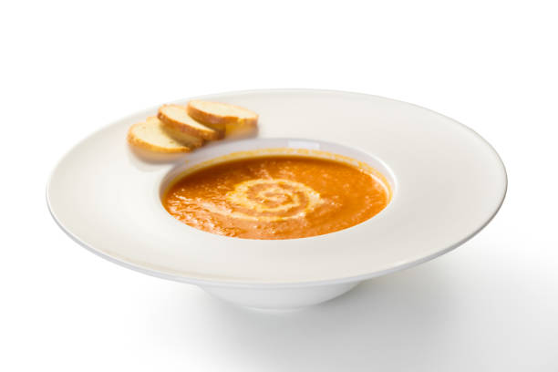 Carrot cream soup puree on white background