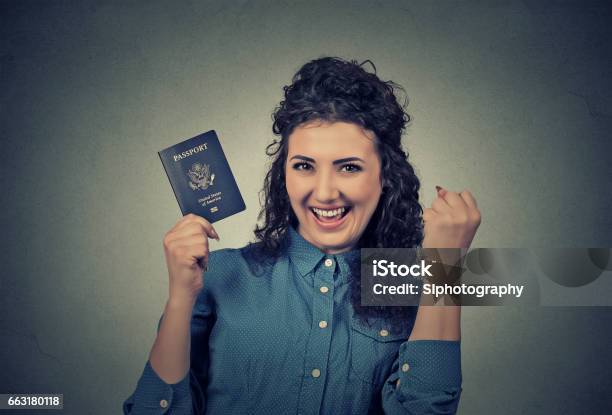 Attractive Young Excited Woman With Usa Passport Stock Photo - Download Image Now - Permission - Concept, USA, Passport