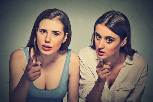 istock Upset angry two women pointing finger at you camera 663190868