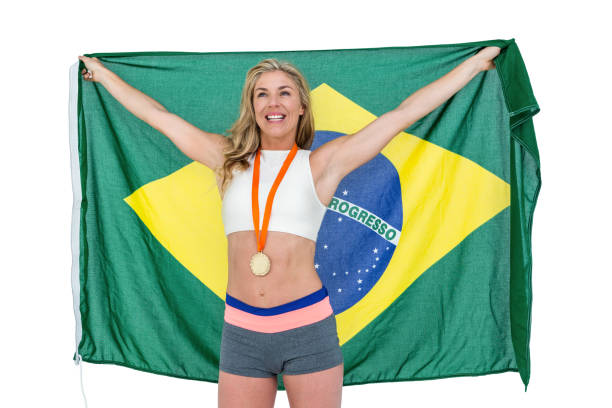 istock Athlete posing with gold medal after victory 663198204