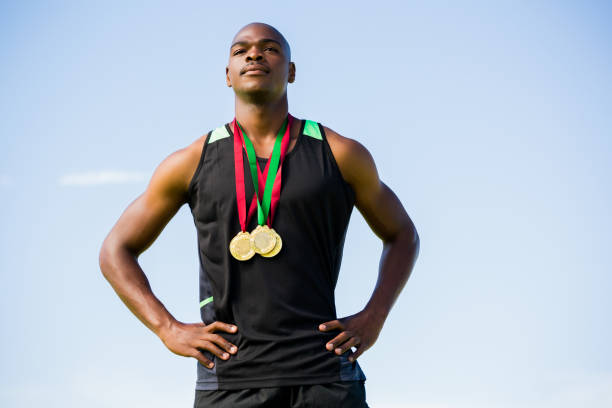 istock Athlete with gold medals around his neck 663210260