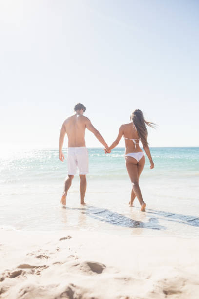 istock happy  couple holding hands 663229032
