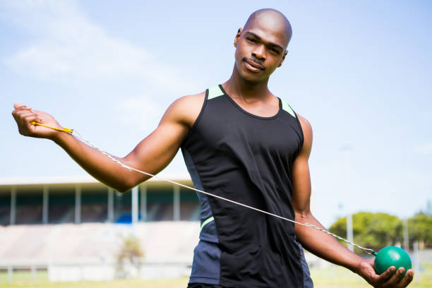 istock Portrait of athlete holding hammer throw 663229130