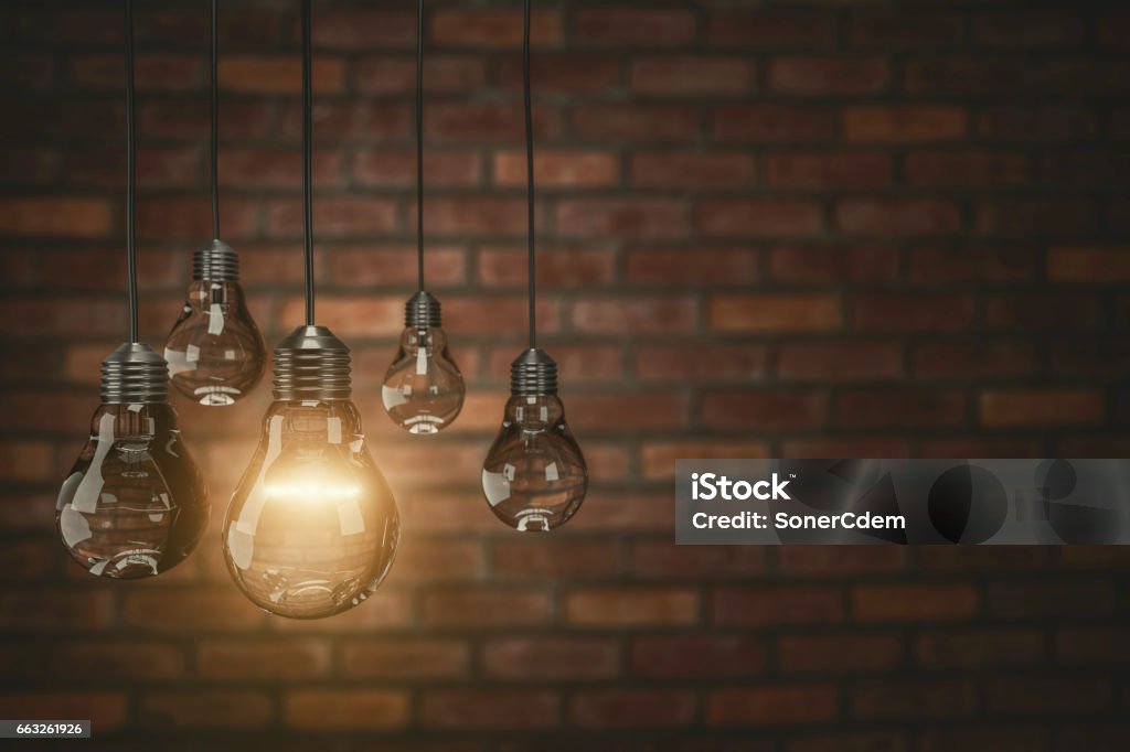 teamwork concept Vintage bulbs on brick wall background, copy space for text,3d rendering teamwork concept Vintage bulbs on wall background, copy space for text,3d rendering Concepts Stock Photo