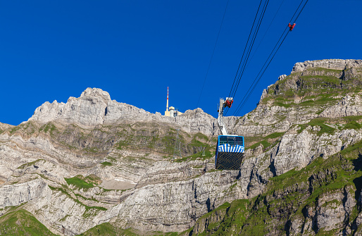 Cablecar running towards Santis (Santis) a famous peak of the Swiss Alps,  Canton of Appenzell, Switzerland