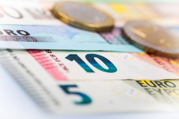 istock Closeup of banknotes and coins 663303204