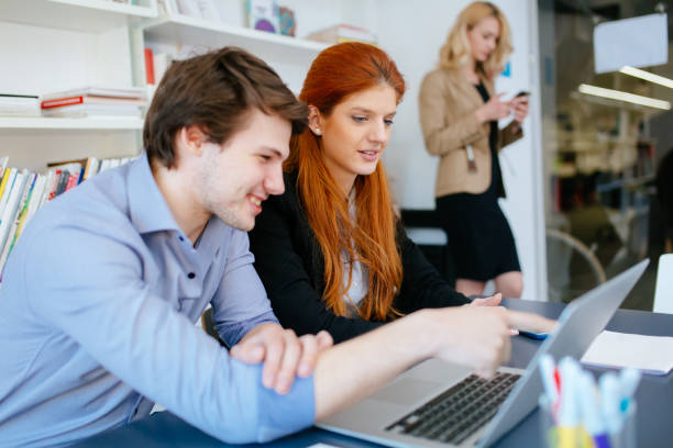 istock Businesspeople working in modern office and collaborating 663303928