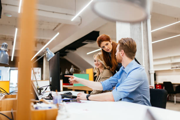 istock Businesspeople working in modern office and collaborating 663311134