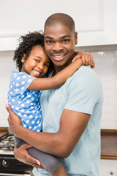 istock Father and daughter in the kitchen 663313460
