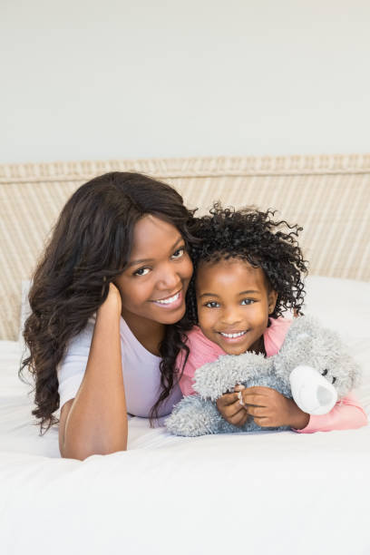 istock Mother and daughter smiling 663325338