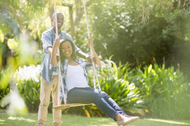 istock Happy family doing swing 663326064
