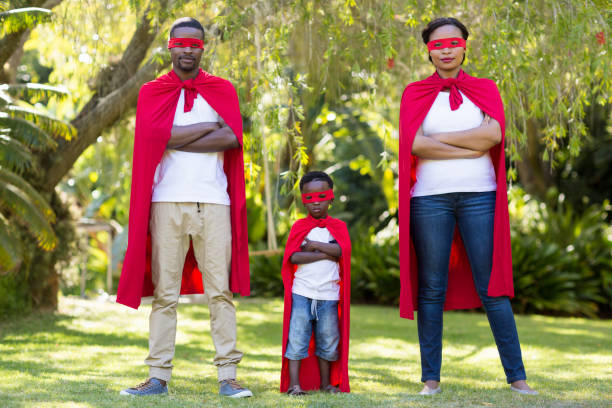 istock Happy family dressing up 663344966