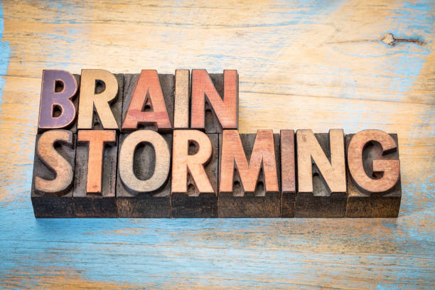 istock brainstorming word abstract in wood type 663345356