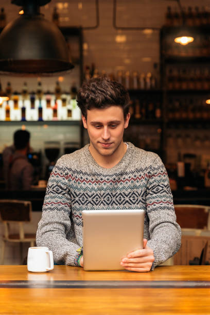 istock Businessman using his laptop in the Coffee Shop. 663351926
